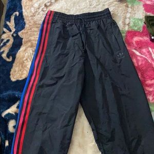 Adidas track pants in multicolor